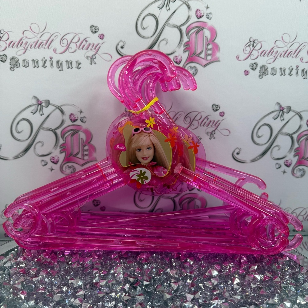 12 Barbie hangers 2001 Bright Pink acrylic Plastic Hangers with Character Accent